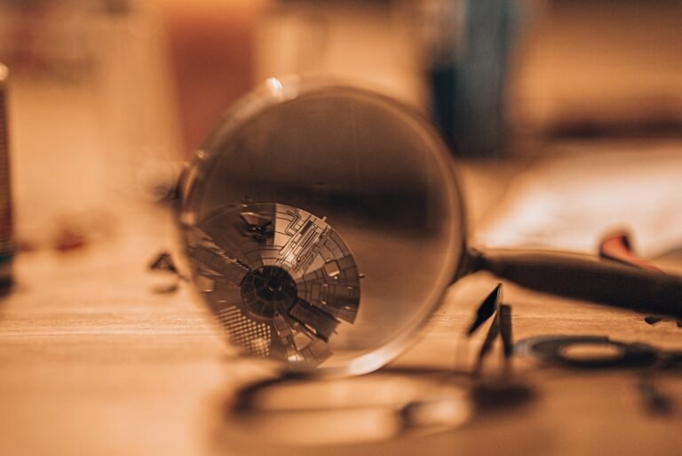 Magnifying glass on a desk representing a fictional cold case mystery game investigation